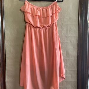 Off-Shoulder Ruffle Dress in Coral asymmetrical ruffle hem with lining